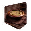 Bol de potage aux champignons Pocket Soupe garni de champignons séchés et de thym, servi sur une nappe brune