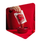 Poudre de soupe aux tomates Pocket Soupe versée d'un sachet dans un bol rouge